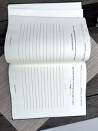 Open spread of A Memory Book - British Childhood showing large-print writing pages